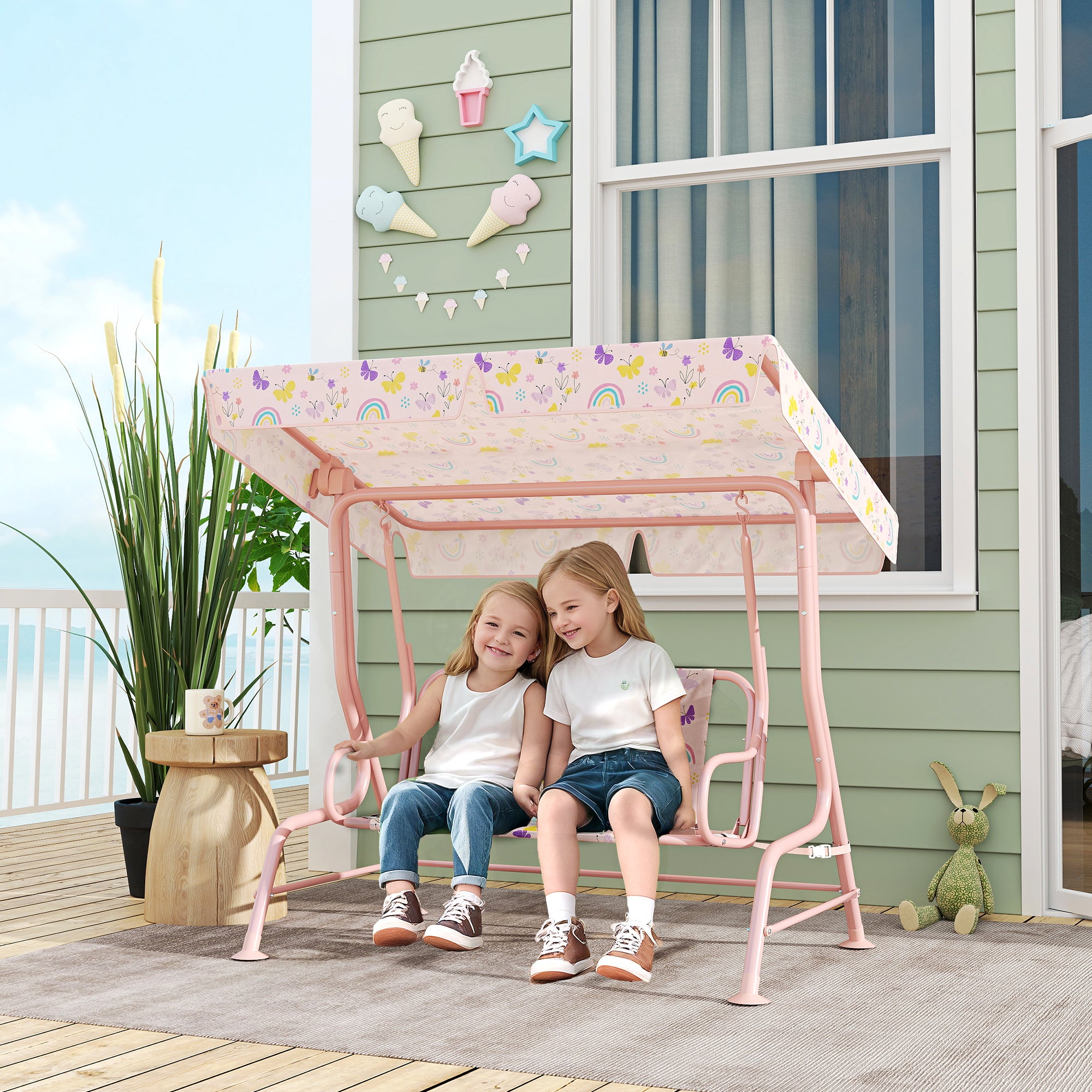 AIYAPLAY Columpio de Jardín Exterior para Niños de +3 Años Balancín de Jardín Exterior de 2 Plazas con Toldo Ajustable Arnés de Seguridad y Estampados Bonitos 112x75x120 cm Rosa