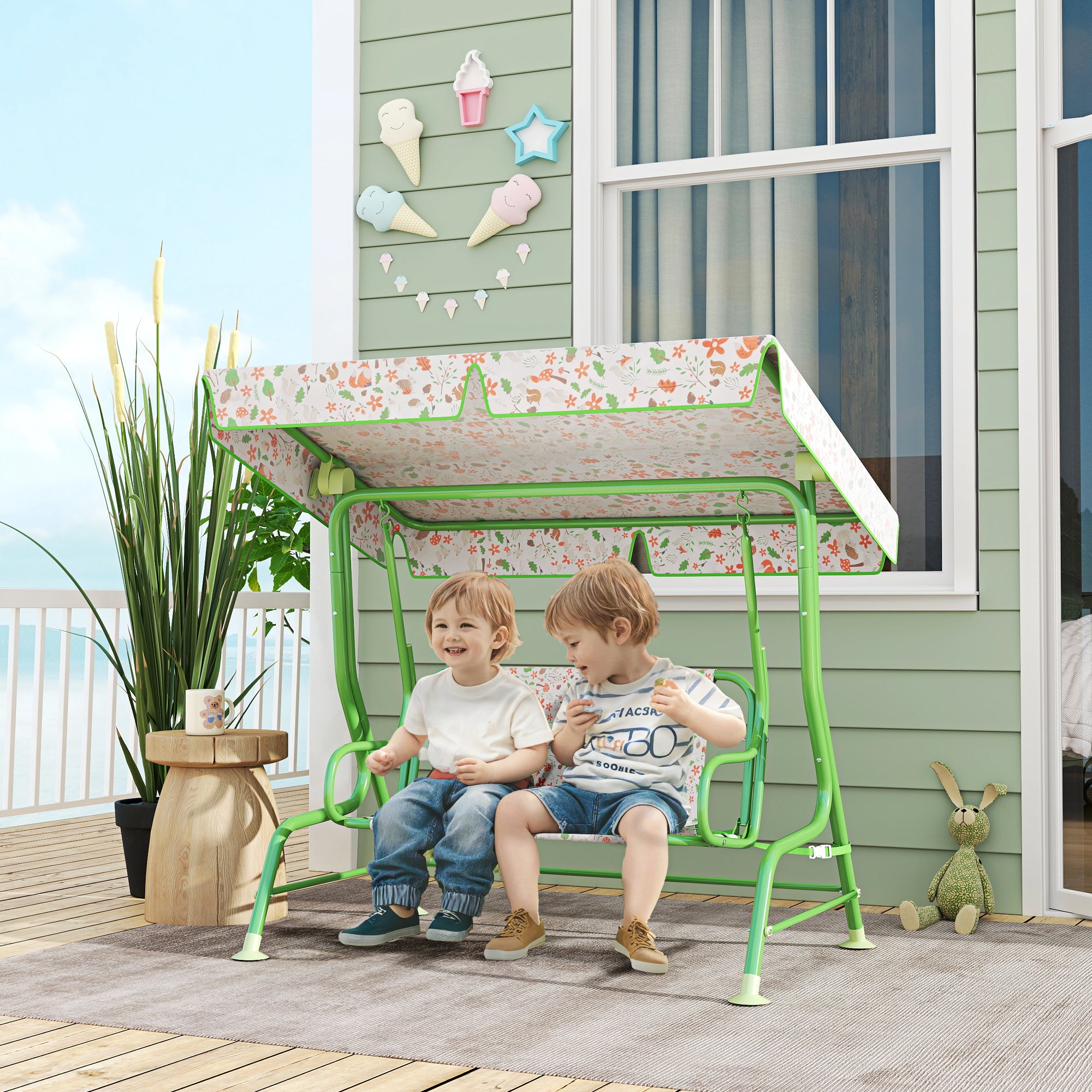 AIYAPLAY Columpio de Jardín Exterior para Niños de +3 Años Balancín de Jardín Exterior de 2 Plazas con Toldo Ajustable Arnés de Seguridad y Estampados Bonitos 112x75x120 cm Verde